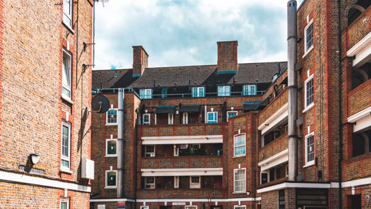 A red and brown council estate on a sunny day