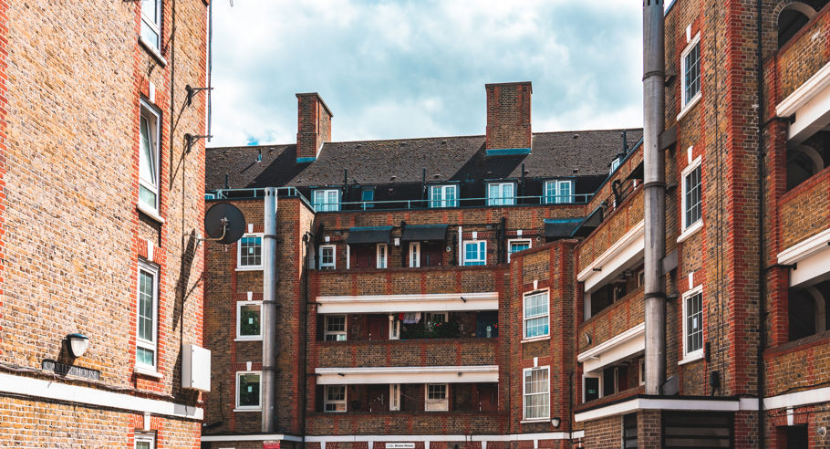 A red and brown council estate on a sunny day