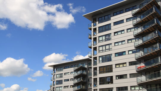 An architectual image of an apartment block