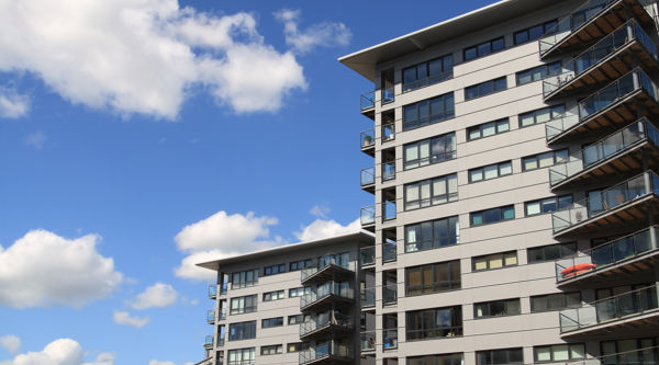 An architectual image of an apartment block